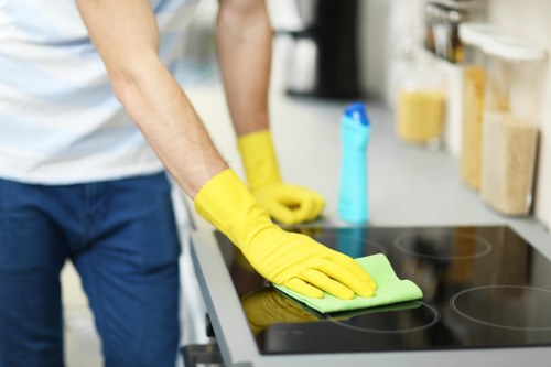 Deep cleaning oven racks and trays in a Bermondsey kitchen